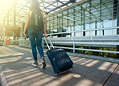 Travel industry icon with airplane and suitcase