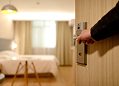 Hotel management icon with building and service bell