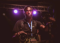 Media and entertainment industry icon with film reel and microphone